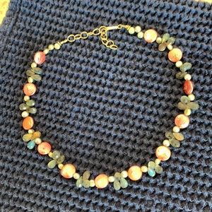 Hand made beaded choker style necklace.